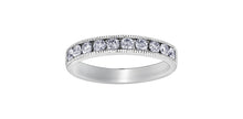 Load image into Gallery viewer, white gold ring with embedded diamonds on a white background