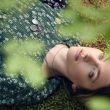 Load image into Gallery viewer, Symbol Charm layered with talismans worn by model