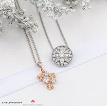 Load image into Gallery viewer, Two necklaces with maple leaf and lily pendants on a white background