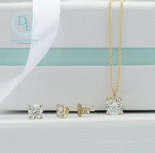 Load image into Gallery viewer, Diamond earrings on a white and blue striped background with a brand logo.
