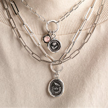 Load image into Gallery viewer, Layered Necklaces on a cream colored background