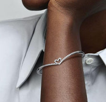 Load image into Gallery viewer, Pandora Sparkling Wishbone Heart Bangle - Fifth Avenue Jewellers