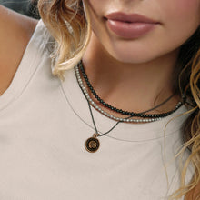 Load image into Gallery viewer, Model wearing talisman
