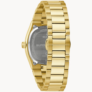 Gold watch with visible brand name on a white background