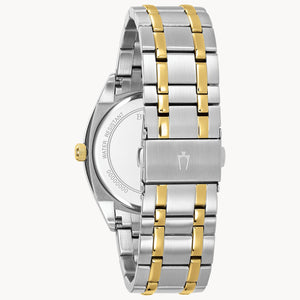 Two-tone silver and gold watch on a white background