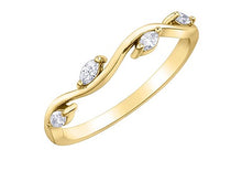 Load image into Gallery viewer, Gold ring with diamond accents on a white background
