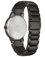 Load image into Gallery viewer, Black watch from the back showing the stainless steel case back
