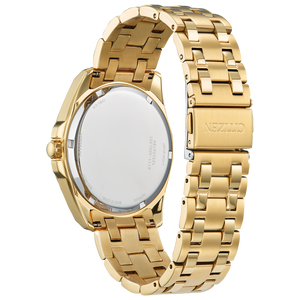 Gold watch with a detailed band on a white background