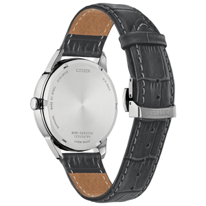 Watch with black leather strap and visible Citizen logo on a white background