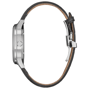 Close-up of a watch with a black leather strap and silver case on a white background
