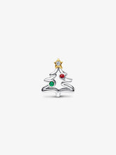 Load image into Gallery viewer, Silver Christmas tree-shaped charm with colored stones on a white background
