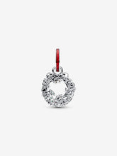 Load image into Gallery viewer, Silver wreath charm with red accent on a white background
