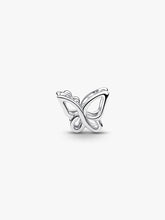 Load image into Gallery viewer, Silver butterfly-shaped charm on a white background
