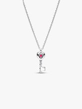 Load image into Gallery viewer, Silver key-shaped pendant with a heart on a white background
