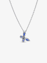 Load image into Gallery viewer, Butterfly-shaped pendant with blue gemstones on a white background

