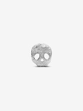 Load image into Gallery viewer, Silver skull-shaped pendant on a white background
