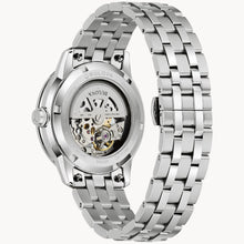 Load image into Gallery viewer, Silver Bulova watch with a detailed back on a white background
