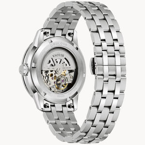 Silver Bulova watch with a detailed back on a white background