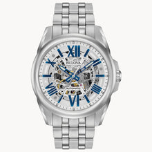 Load image into Gallery viewer, Silver Bulova watch with a white face and blue accents on a white background Fifth Avenue Jewellers Kamloops BC
