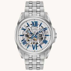 Silver Bulova watch with a white face and blue accents on a white background Fifth Avenue Jewellers Kamloops BC