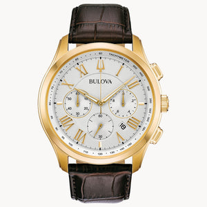 Bulova watch with gold case and brown leather strap on a white background Fifth Avenue Jewellers Kamloops BC