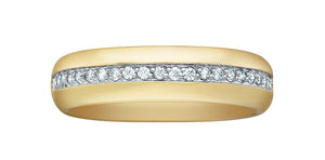Gold ring with diamond accents on a white background 6mm wide