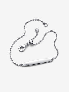 Silver bracelet with a nameplate on a white background
