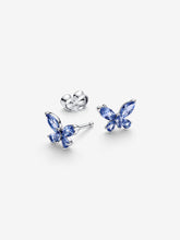 Load image into Gallery viewer, Butterfly-shaped earrings with blue gemstones on a white background

