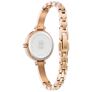 Rose gold watch with a white face on a white background