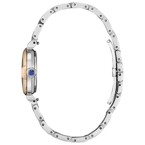 Silver watch with a blue gemstone on a white background