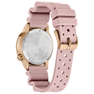 Pink watch with gold accents on a white background