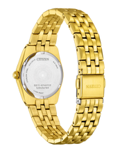 Load image into Gallery viewer, Gold Toned watch from the back showing stainless steel case back
