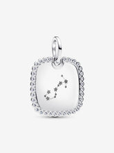 Load image into Gallery viewer, Silver pendant with star design on a white background
