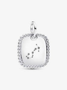 Silver pendant with star design on a white background
