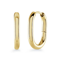 Load image into Gallery viewer, Gold hoop earrings on a white background

