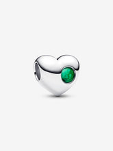 Load image into Gallery viewer, Heart-shaped silver charm with a green gemstone on a white background
