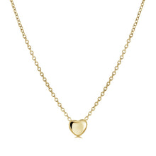 Load image into Gallery viewer, Gold heart-shaped pendant necklace on a white background
