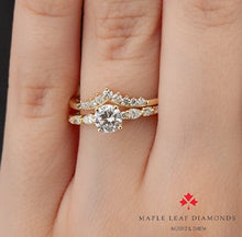 Load image into Gallery viewer, Tiara band and engagement ring on a hand with Maple Leaf Diamonds logo.
