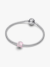 Load image into Gallery viewer, Silver bracelet with a pink cube charm on a white background
