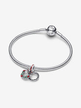 Load image into Gallery viewer, Silver bracelet with a wreath-shaped charm on a white background
