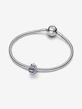 Load image into Gallery viewer, Silver bracelet with hamsa hand charm set with a blue gemstone on a white background
