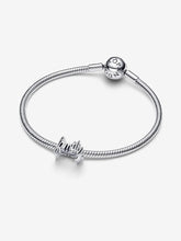 Load image into Gallery viewer, Silver bracelet with a &quot;Family&quot; charm on a white background
