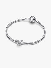 Load image into Gallery viewer, Silver bracelet with a butterfly charm on a white background
