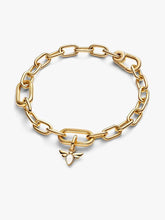 Load image into Gallery viewer, Gold toned chain bracelet with a butterfly charm on a white background
