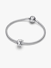 Load image into Gallery viewer, Silver bracelet with a moon charm on a white background
