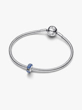 Load image into Gallery viewer, Silver bracelet with a blue charm on a white background

