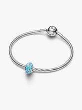 Load image into Gallery viewer, Silver bracelet with a blue and clear bead on a white background
