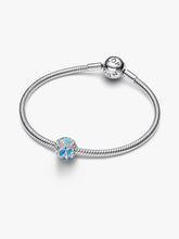 Load image into Gallery viewer, Silver bracelet with a blue and silver charm on a white background
