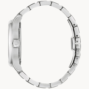 Close-up of a silver watch band on a white background