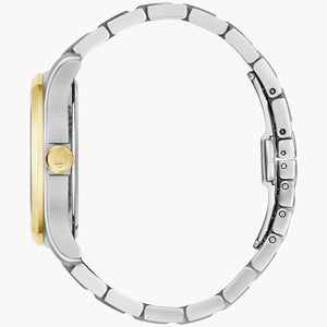 Close-up of a watch with a silver and gold band on a white background